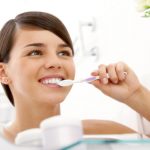 regular brushing is still required after tooth extraction